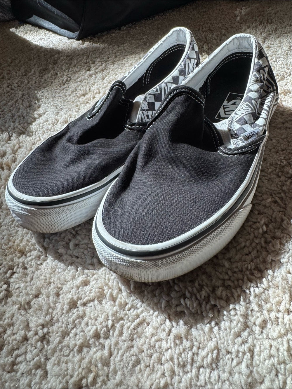 Vans Slip-On Sneakers in Black and White Checker Trim